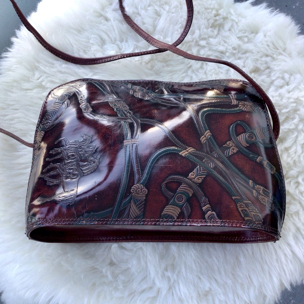 Stunning Glossy Oxblood Leather and Intricately Tooled Equestrian Handbag